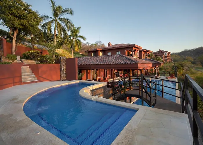 Сasa de vacaciones Bright 2br With Partial Ocean View - Bougainvillea - Reserva Conchal